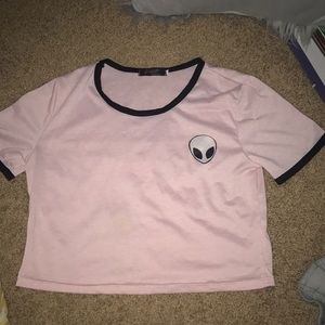 Pink crop top with alien graphic